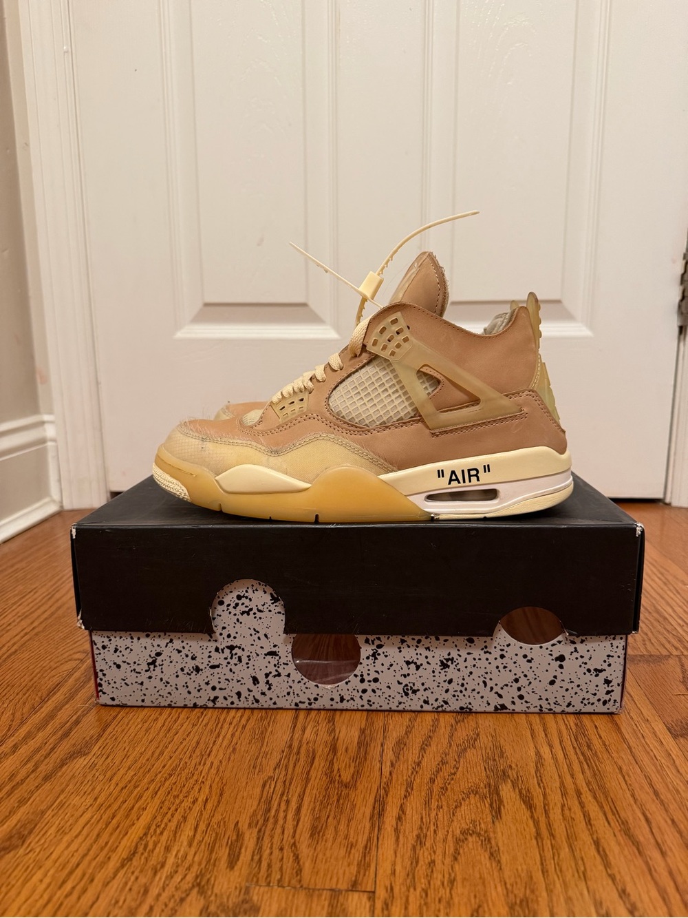 Women’s Nike Air Jordan 4 Retro SP x Off White “Sail” Sneakers